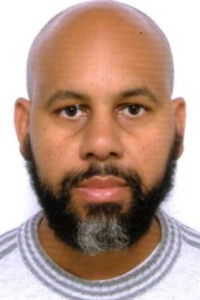 Грег Де Кьюир